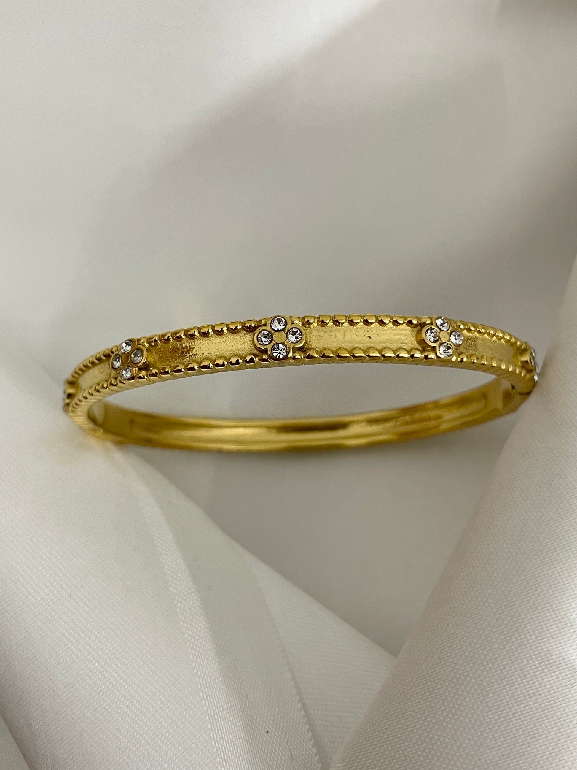 Gold 4-stone studded bangle
