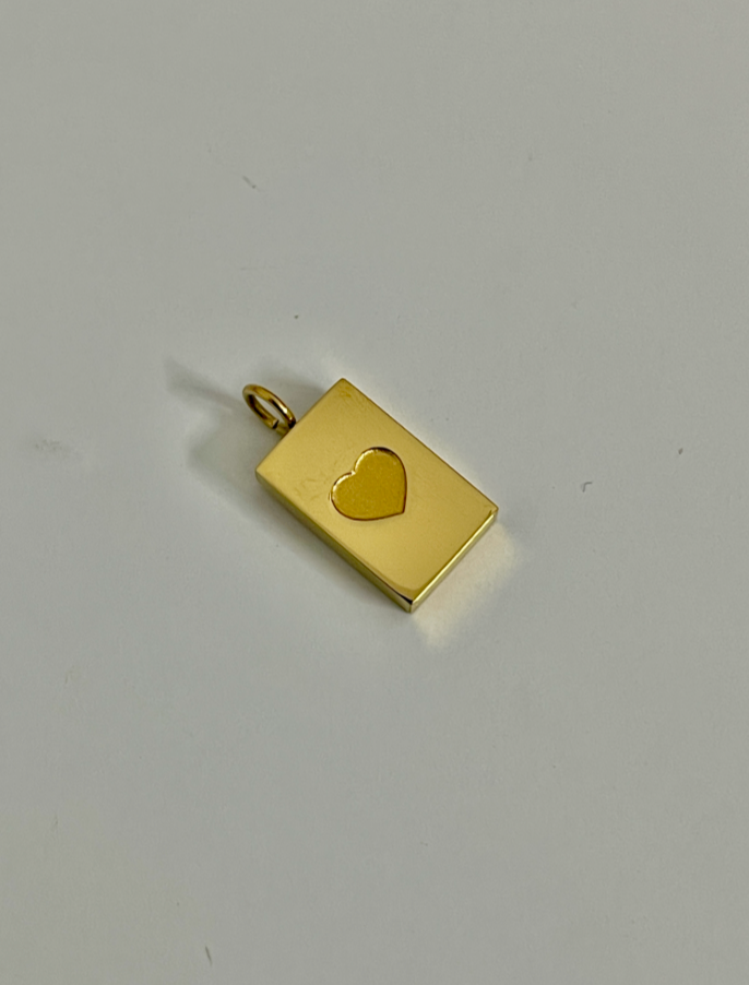 Carved heart charm