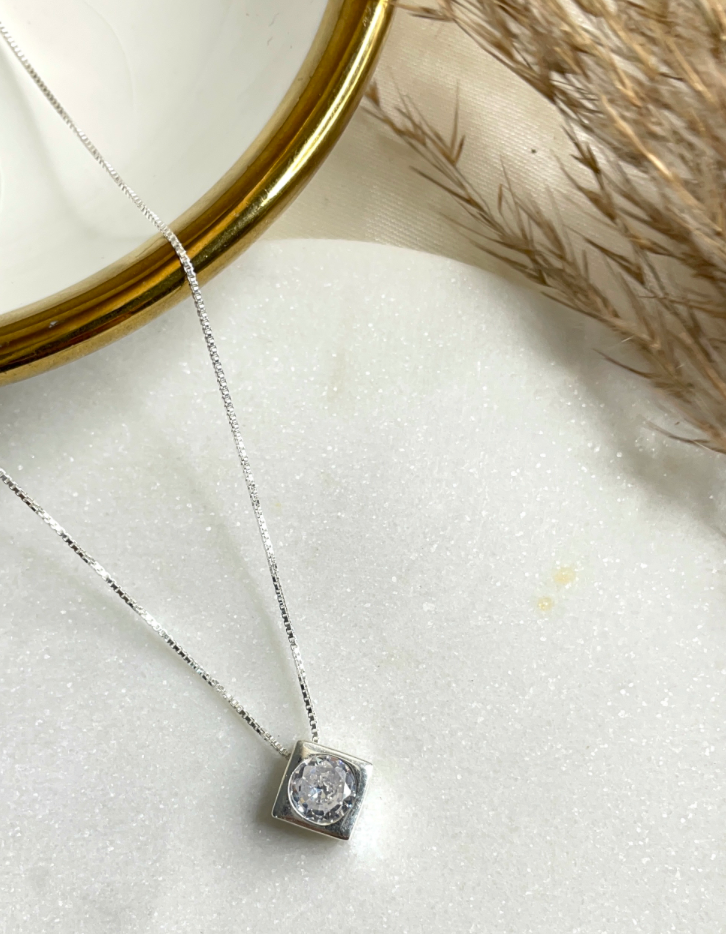 Squared bezel set Solitaire in 92.5 sterling silver