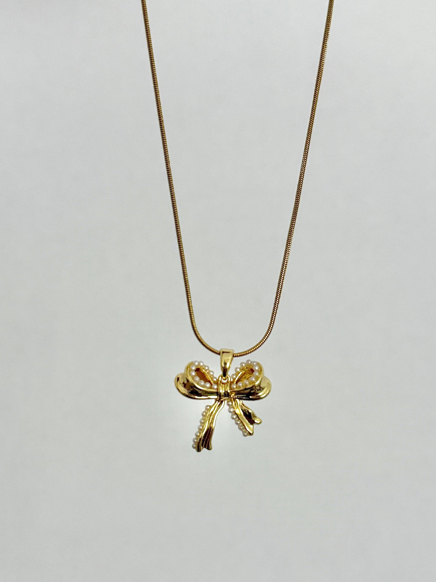 Paloma Bow Necklaces