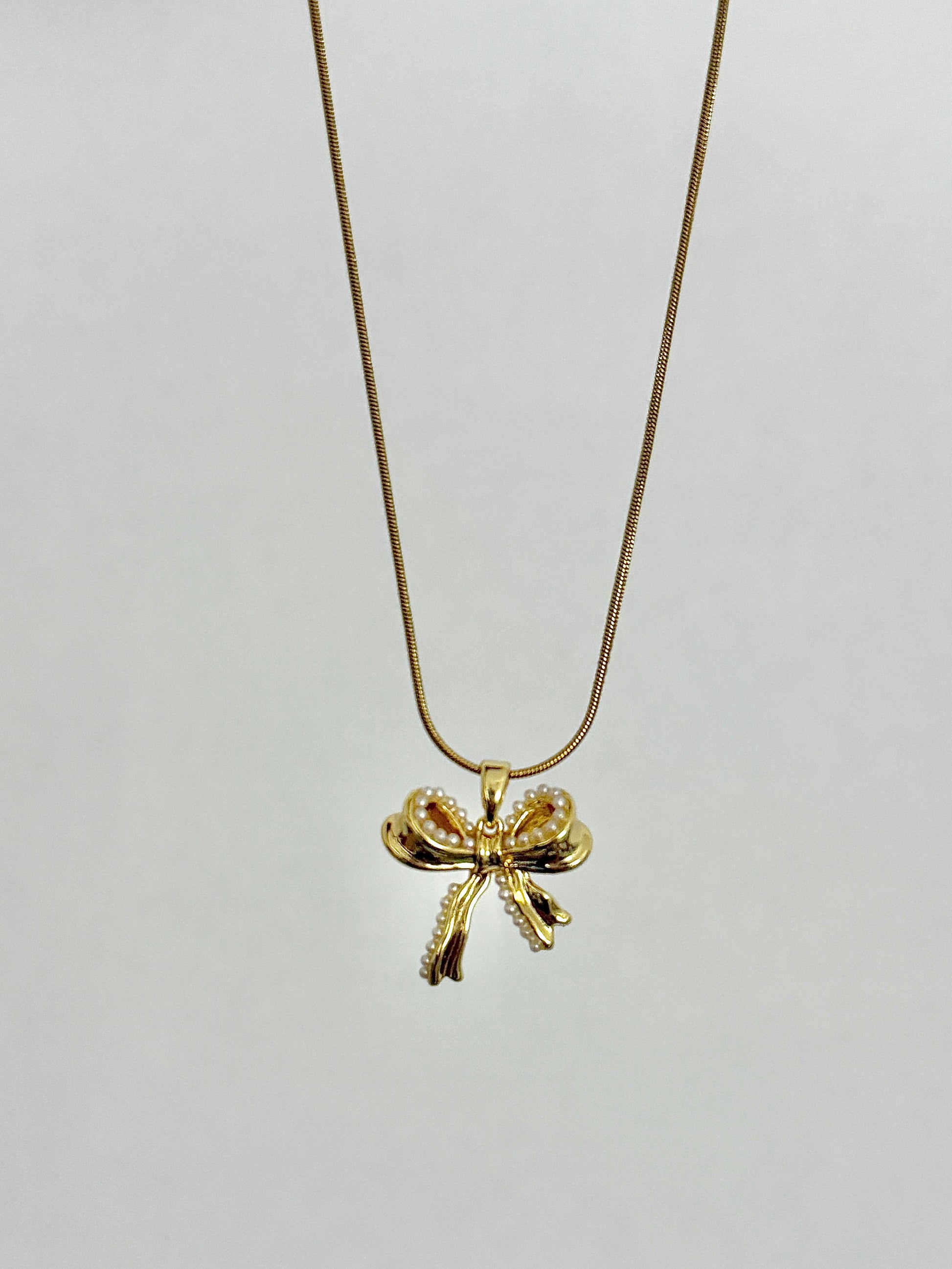 Paloma Bow Necklaces