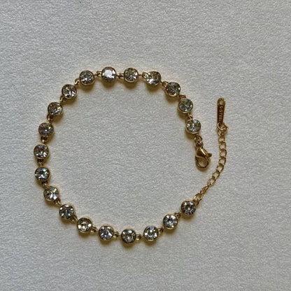 Norma Bezel Tennis Fluid Bracelet